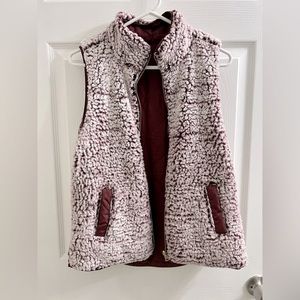 Fransesca’s reversible maroon Sherpa winter vest